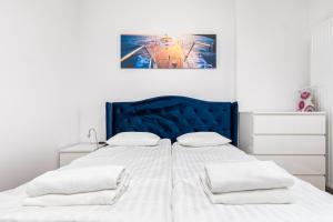 Posteľ alebo postele v izbe v ubytovaní Kasprzaka 29 B-C by Homeprime
