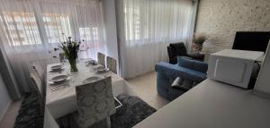 Posedenie v ubytovaní APARTMENT AMBER s podzemnom garažom