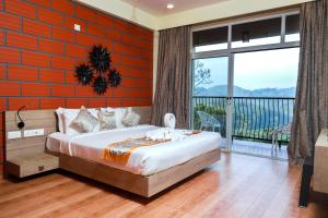 Krevet ili kreveti u jedinici u okviru objekta Serene Crest Resort