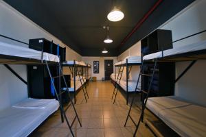 a row of bunk beds in a dorm room at Tiberias Hostel in Tiberias