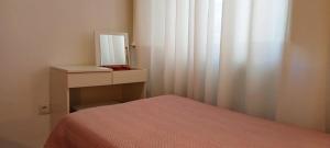 Postel nebo postele na pokoji v ubytování Hostal Bahía