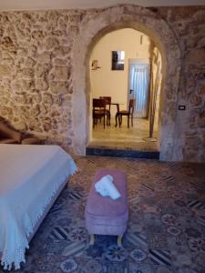 Ένα ή περισσότερα κρεβάτια σε δωμάτιο στο Suite Vaniglia