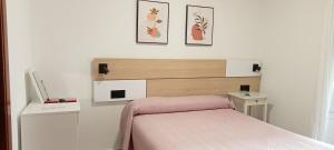 Postel nebo postele na pokoji v ubytování Hostal Bahía