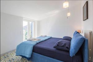 A bed or beds in a room at Casa Flora