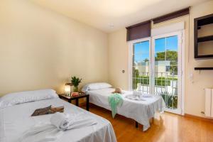Postel nebo postele na pokoji v ubytování Villa Dorada - PlusHolidays