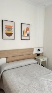 Postel nebo postele na pokoji v ubytování Hostal Bahía