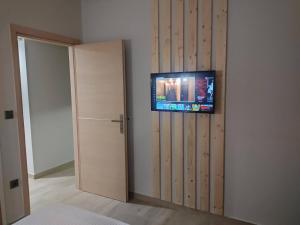TV a/nebo společenská místnost v ubytování Clessidra