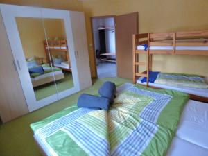 Postel nebo postele na pokoji v ubytování Adrett