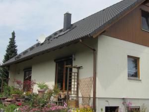 a house with a pitched roof at Adrett in Hermsdorf