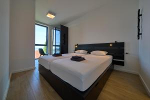 Postel nebo postele na pokoji v ubytování Kuća Bella + 34 fotografií