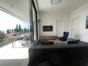 TV a/nebo společenská místnost v ubytování Kuća Bella