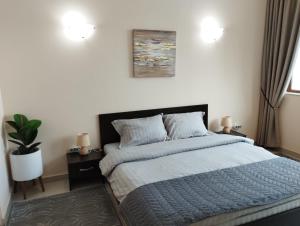 Кровать или кровати в номере Privat apartament Golf Coast