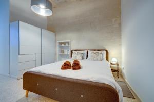 Letto o letti in una camera di Comfy 2 BR Flat in the Heart of Valletta