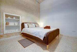 Letto o letti in una camera di Comfy 2 BR Flat in the Heart of Valletta