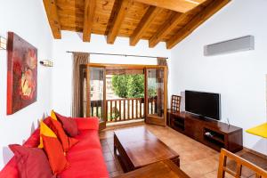 TV a/nebo společenská místnost v ubytování Apartamento Duplex Puente de Piedra, en un enclave único y exclusivo