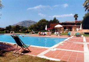 Bazén v ubytování Porto Rotondo Olbia Sardegna nebo v jeho okolí