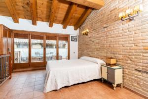 Postel nebo postele na pokoji v ubytování Apartamento Duplex Puente de Piedra, en un enclave único y exclusivo