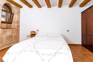 Postel nebo postele na pokoji v ubytování Apartamento Duplex Puente de Piedra, en un enclave único y exclusivo