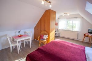 Postel nebo postele na pokoji v ubytování Apfelhof Wegener Elstar Topaz + 4 fotografie