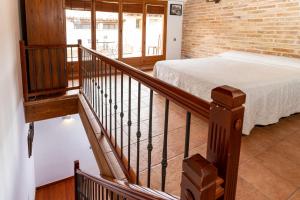 Postel nebo postele na pokoji v ubytování Apartamento Duplex Puente de Piedra, en un enclave único y exclusivo