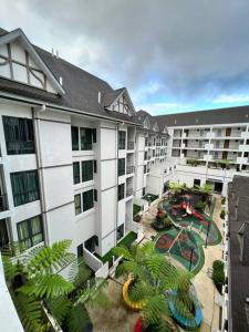 an aerial view of an apartment complex with a playground at Lily Ville in Tanah Rata