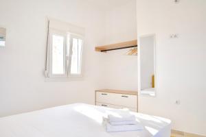 Postel nebo postele na pokoji v ubytování Asteria Apartments