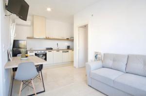 Kuchyň nebo kuchyňský kout v ubytování Asteria Apartments