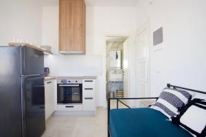 Kuchyň nebo kuchyňský kout v ubytování Asteria Apartments
