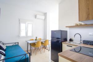 Kuchyň nebo kuchyňský kout v ubytování Asteria Apartments