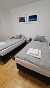 Posteľ alebo postele v izbe v ubytovaní South 2 Osijek