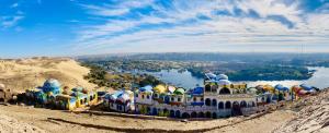 a large building on the side of a mountain at Kato Dool Wellness Resort in Aswan