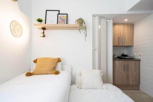 Postel nebo postele na pokoji v ubytování Estudio con encanto en Fuencarral
