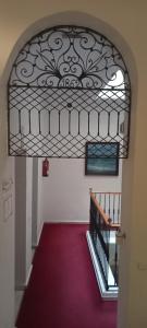 Postel nebo postele na pokoji v ubytování Hostal Bahía
