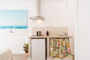 Kuchyňa alebo kuchynka v ubytovaní Studio Malagueta beach