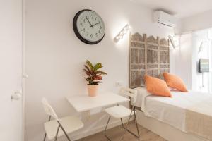 Posteľ alebo postele v izbe v ubytovaní Studio Malagueta beach
