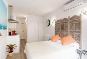 Posteľ alebo postele v izbe v ubytovaní Studio Malagueta beach