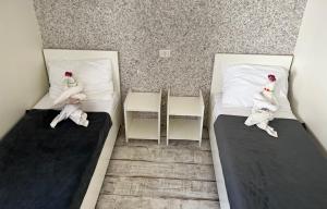 Postel nebo postele na pokoji v ubytování AmA