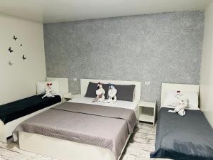 Postel nebo postele na pokoji v ubytování AmA