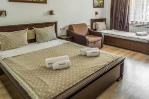 A bed or beds in a room at Sunny Paradise ll