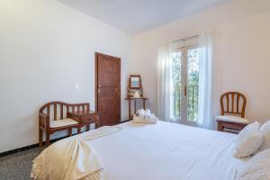 Postel nebo postele na pokoji v ubytování Sa Teulera de Sencelles