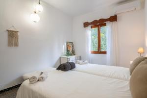 Postel nebo postele na pokoji v ubytování Sa Teulera de Sencelles