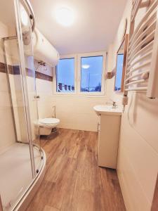 Kúpeľňa v ubytovaní Orkana 10C by Homeprime + 11 fotografií
