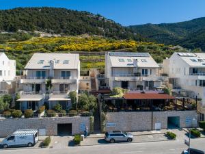 a view of a city with houses at Apartments Villa Azzurra Bol in Bol