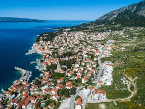 an aerial view of a town next to the water at Apartments Villa Azzurra Bol in Bol