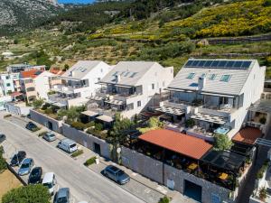 an aerial view of a building in a city at Apartments Villa Azzurra Bol in Bol