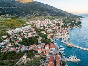 an aerial view of a town on the water at Apartments Villa Azzurra Bol in Bol