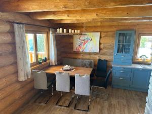 Kuchyň nebo kuchyňský kout v ubytování Reimers Chalets Hochrindl 2A