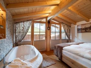 Ένα ή περισσότερα κρεβάτια σε δωμάτιο στο Luxusappartement Alpenliebe