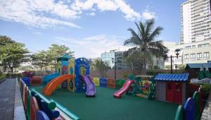a playground in a park with a play area at Flat Barra - Liberty Place in Rio de Janeiro