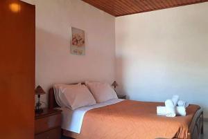 Postel nebo postele na pokoji v ubytování CORFU MAGDAS HOLIDAY